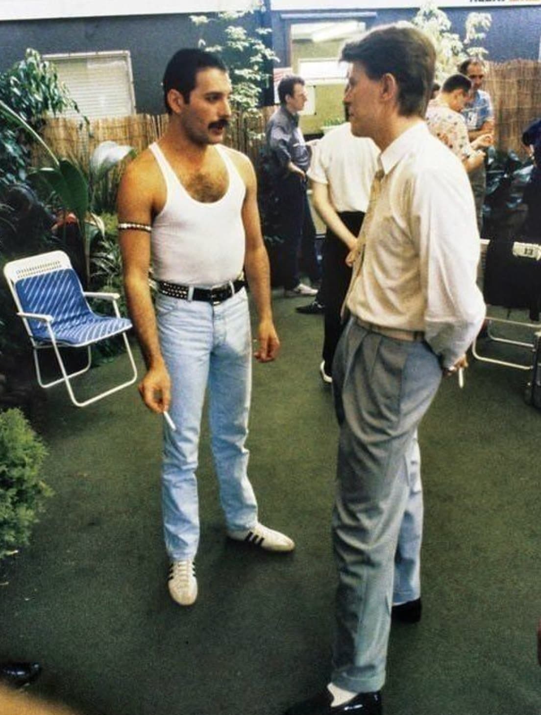 David Bowie and Freddie Mercury chat backstage at the concert